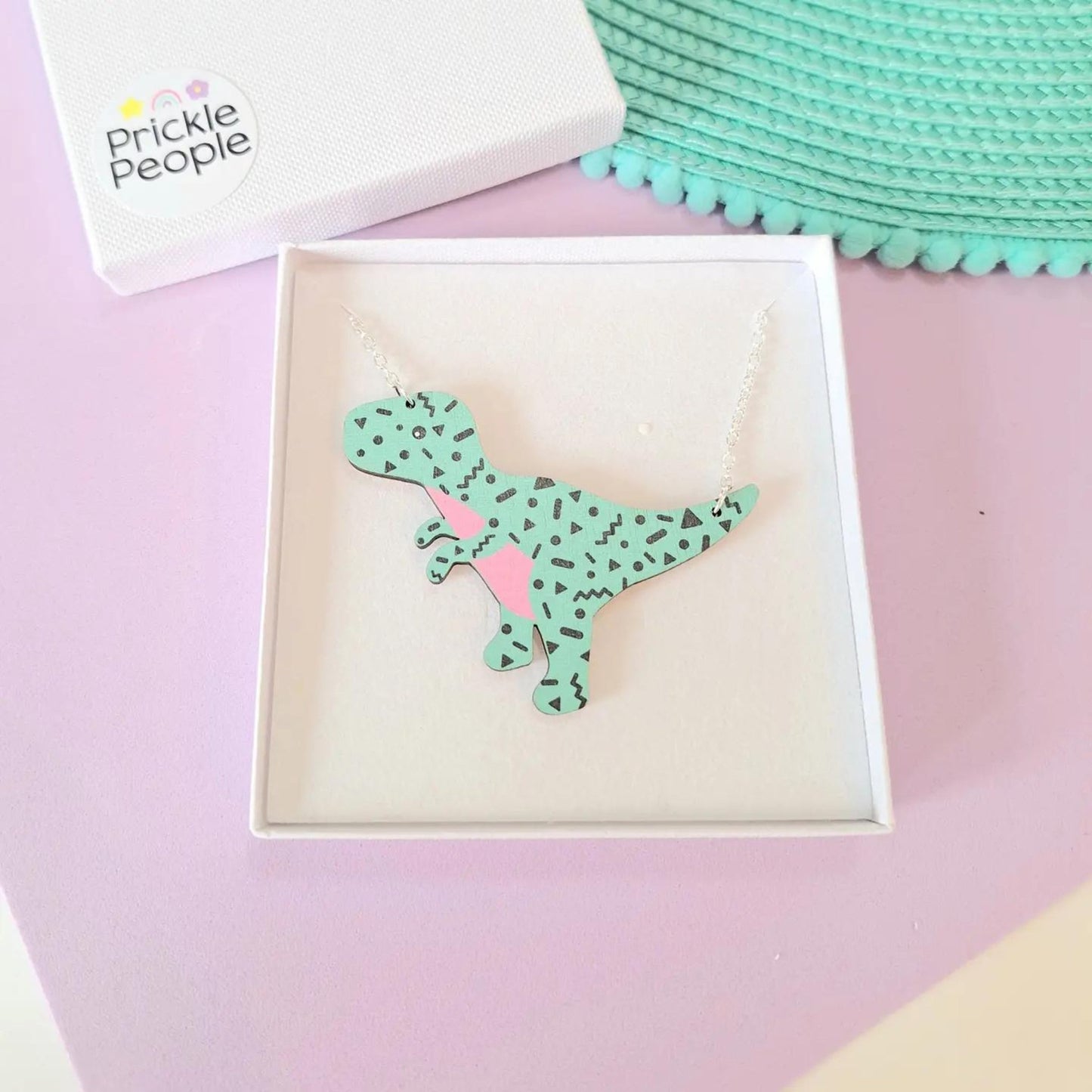 Turquoise Retro Pattern T - Rex Dinosaur Necklace - The Little Jewellery Company