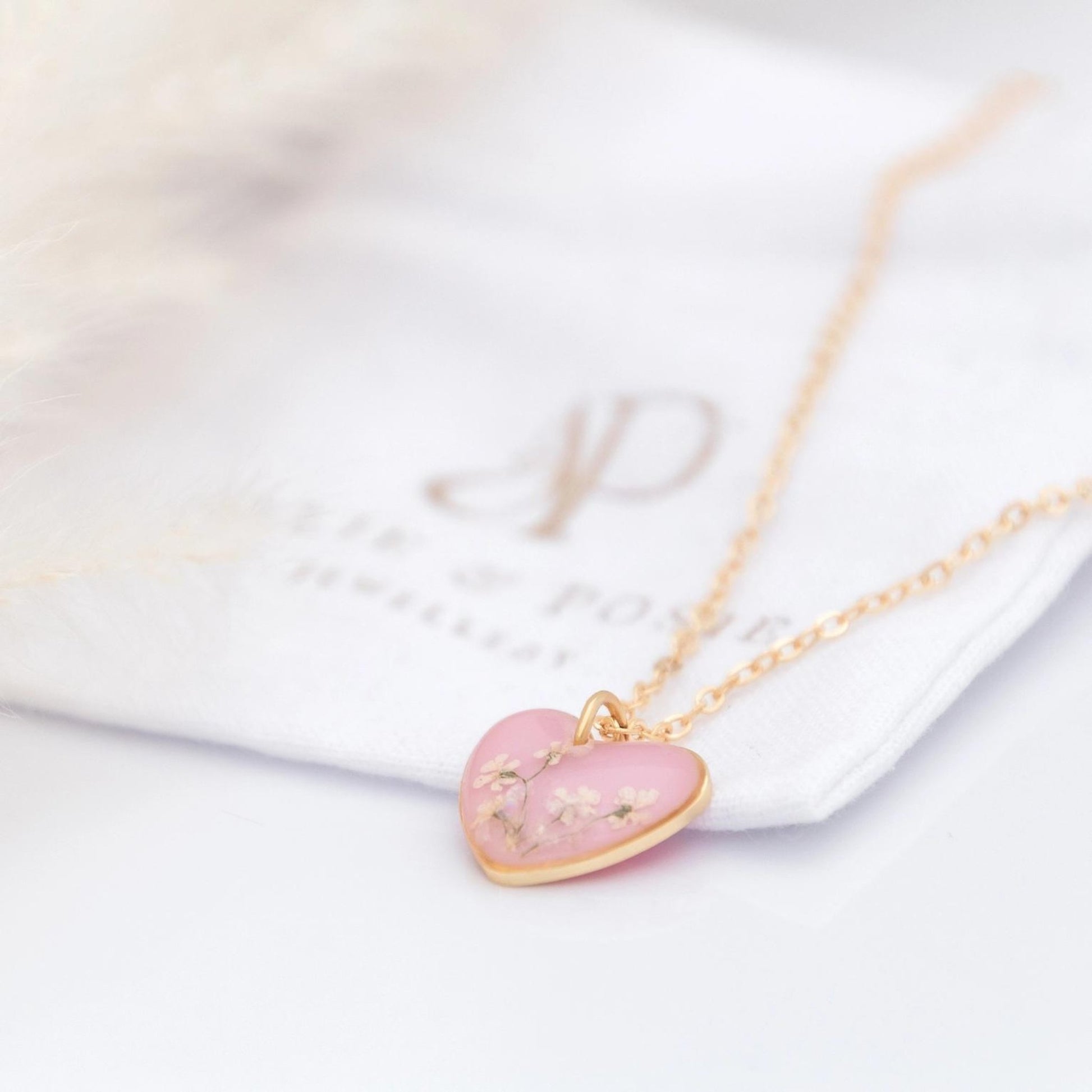 Light Pink Heart Necklace With Real White Flowers In Resin - The Little Jewellery Company