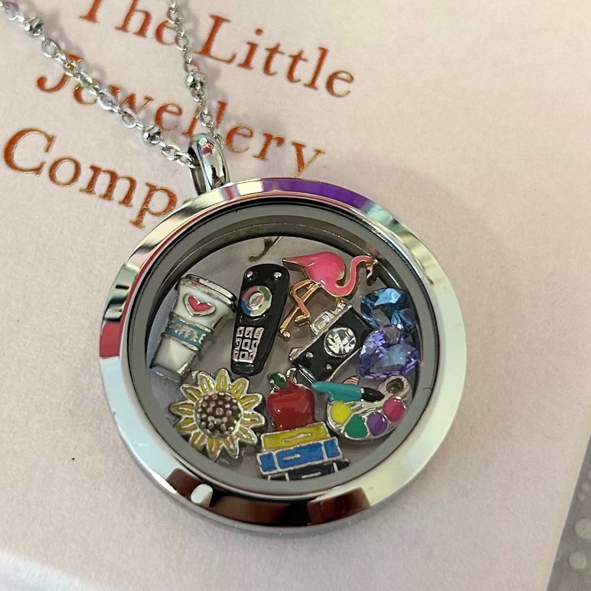 Silver memory outlet locket